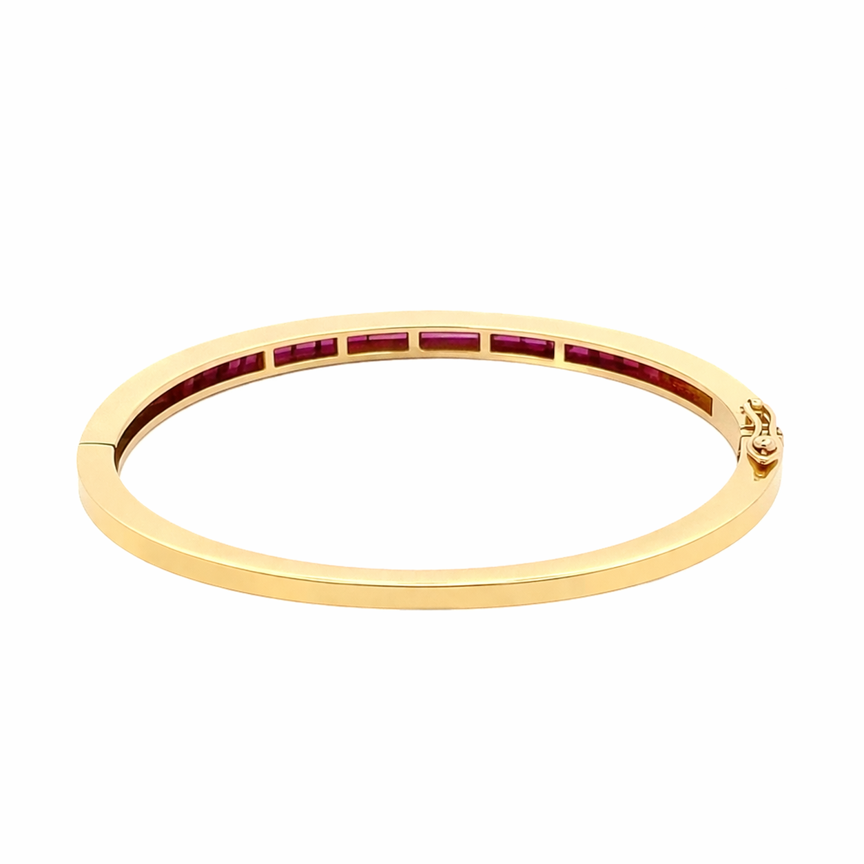 Bracciale rigido in oro giallo e rubini (2012)