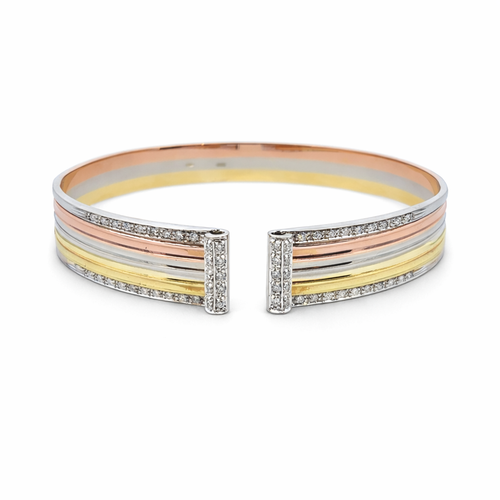Bracciale in oro giallo bianco e rosa e diamanti (1945)