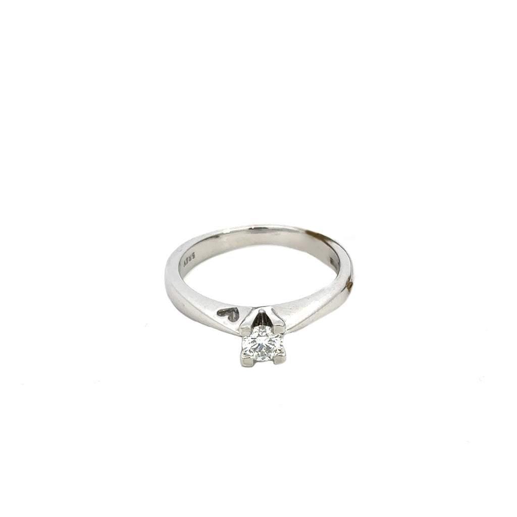 Anello solitario in oro bianco e cuoricino (1328)