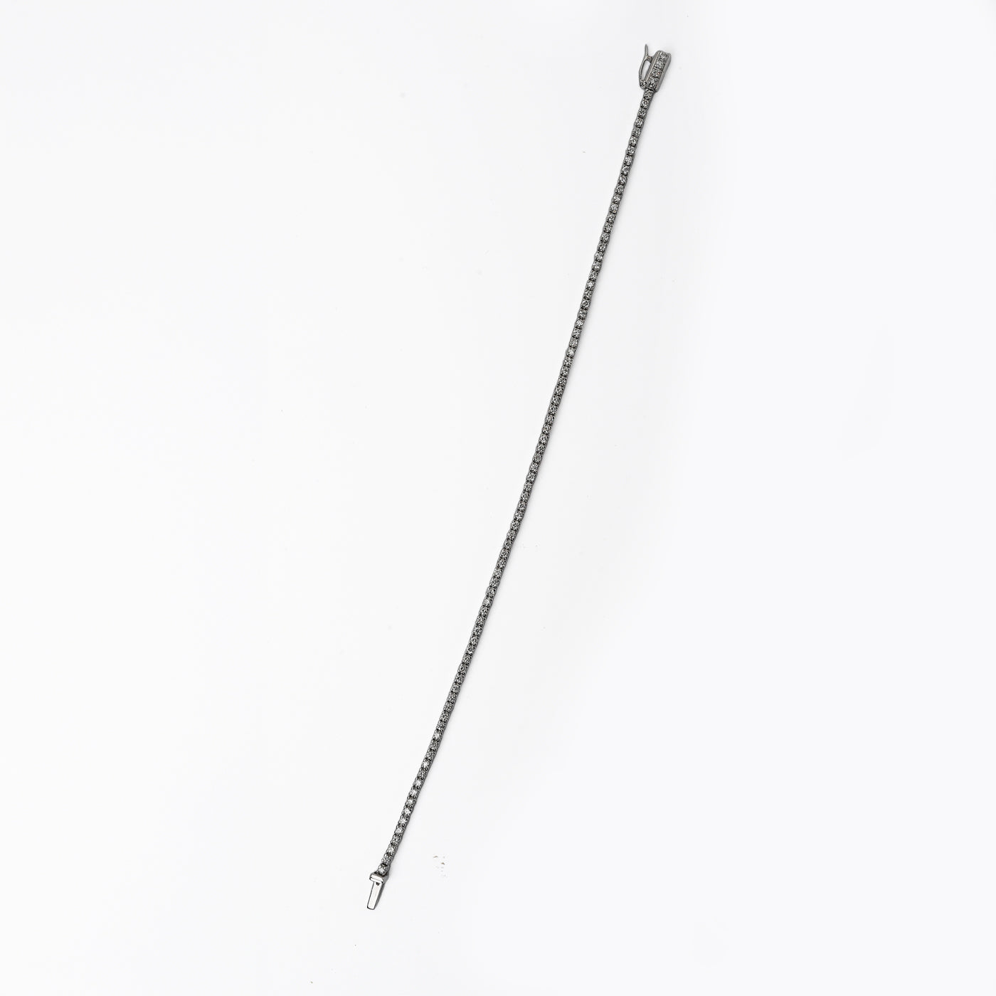 Bracciale tennis in oro bianco e diamanti (1883)