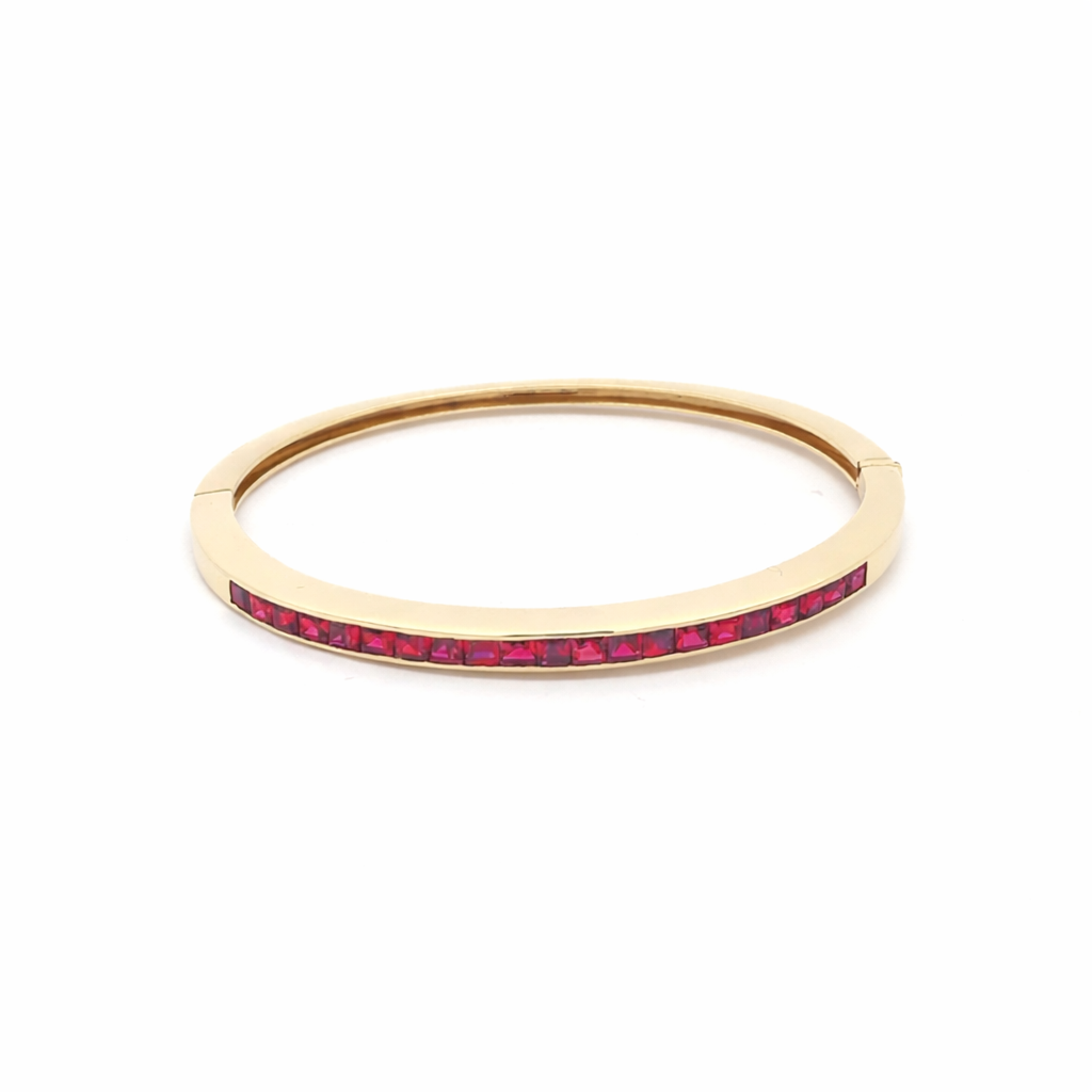 Bracciale rigido in oro giallo e rubini (2012)