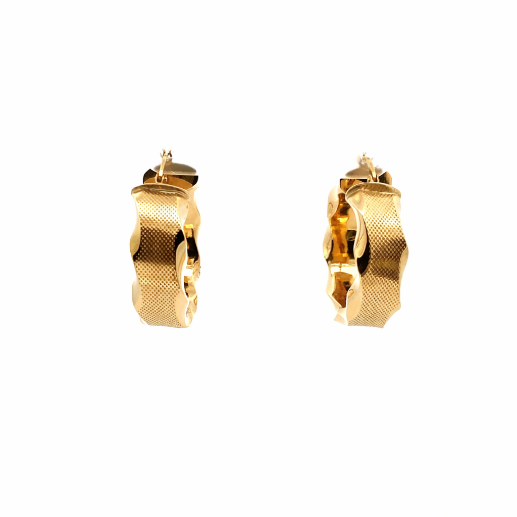 Orecchini a cerchio in oro giallo (1562)