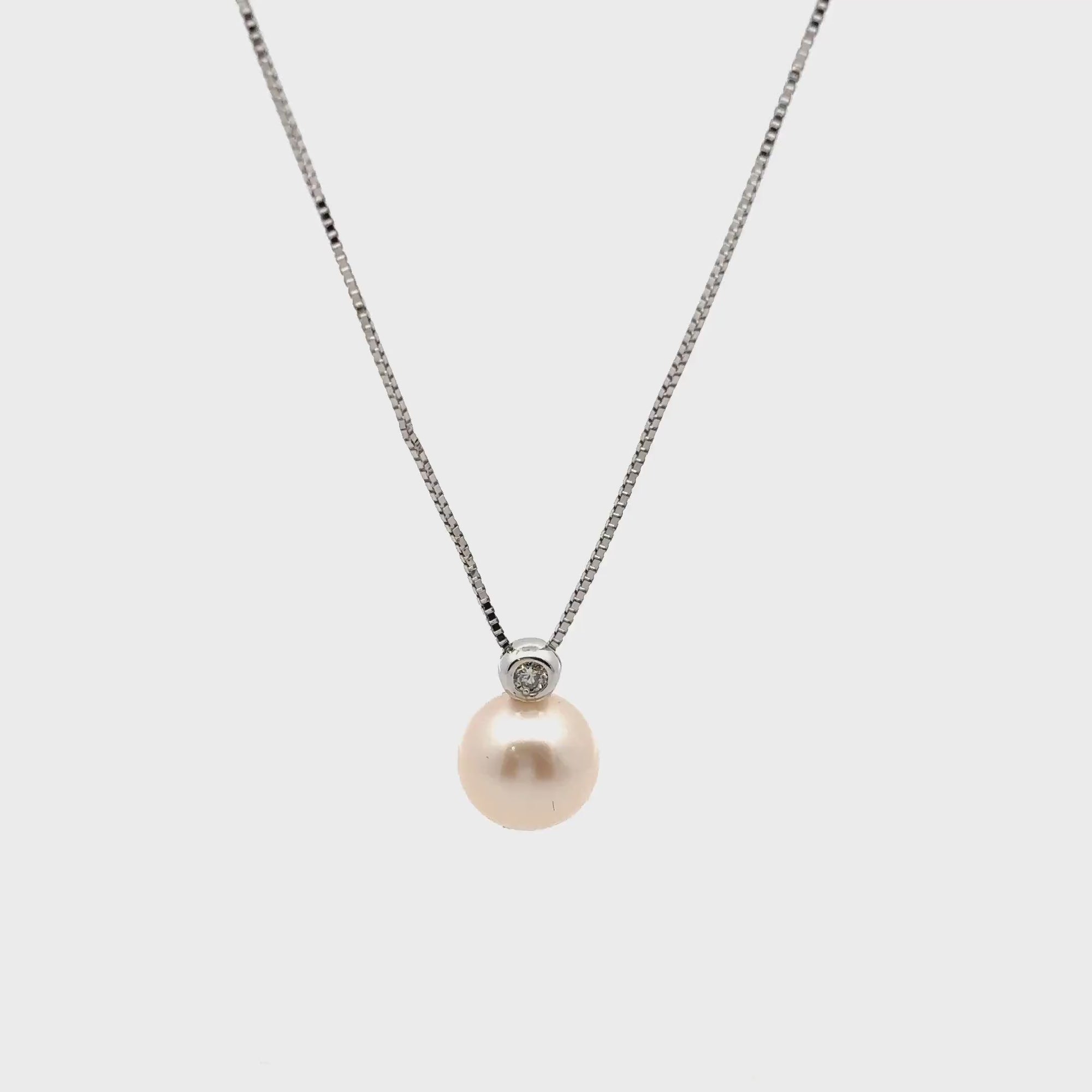 Collana in oro bianco con perla (1421)